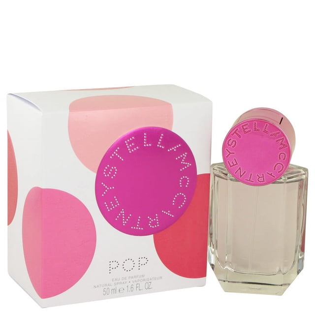Stella McCartney SMPES16 50 ml Pop Eau De Parfum Spray perfume for women, presented in a clear glass bottle with a bold pink circular cap embossed with the brand name. The packaging features a lively design with pink and peach tones, reflecting the fragrance's notes of violet leaf, tomato leaf, green mandarin, tuberose, frangipani, sandalwood, cedar, and musk.