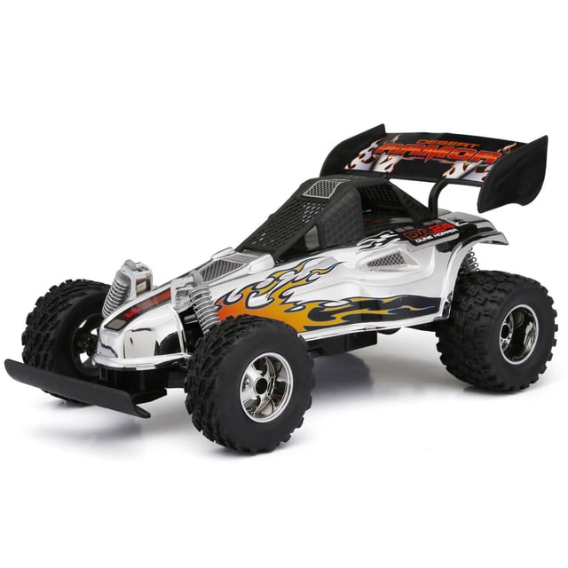 New Bright 1:16 RC Chrome Buggy Remote Control Buggy Chrome with knobby off-road tires, spring suspension, flame decals on a reflective silver body, black mesh cockpit, and a black rear spoiler labeled Desert Armor, shown in a 3/4 front view on a white background, ideal for off-road racing and beginner RC users.