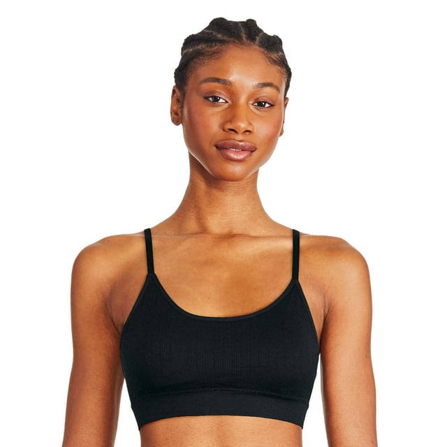 George Women's Crop Bralette in black rib knit fabric with a round neckline, removable pads, adjustable and convertible spaghetti straps, and an elasticized band for support, shown front-facing on a model with bare shoulders and midriff, ideal for everyday wear and layering under various tops.