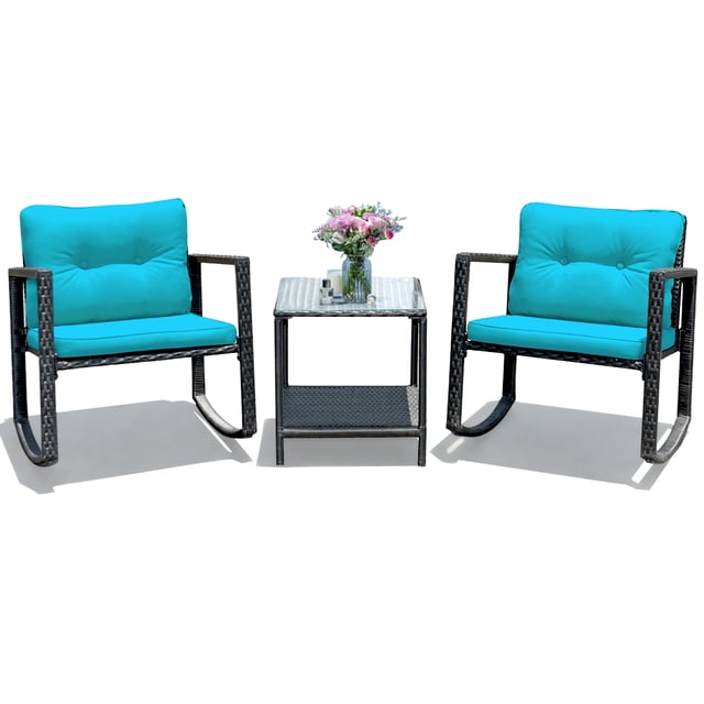 Costway 3PCS Patio Rattan Furniture Set with two black rattan rocking chairs featuring blue cushions and a coffee table with a tempered glass top and lower storage shelf. This cushioned conversation set is ideal for patios, gardens, and poolside areas, offering a relaxing rocking design for outdoor comfort.