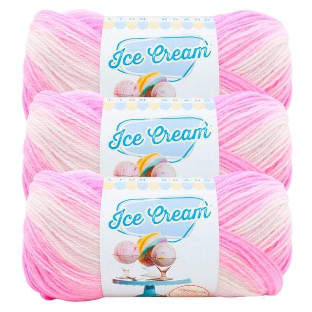 Lion Brand Ice Cream® Yarn #3 Light/DK Yarn 100g/360m 3-Pack featuring three skeins of soft, machine-washable acrylic yarn in self-striping pink and white tones, ideal for knitting baby garments and blankets, with labels showing colorful ice cream scoops.