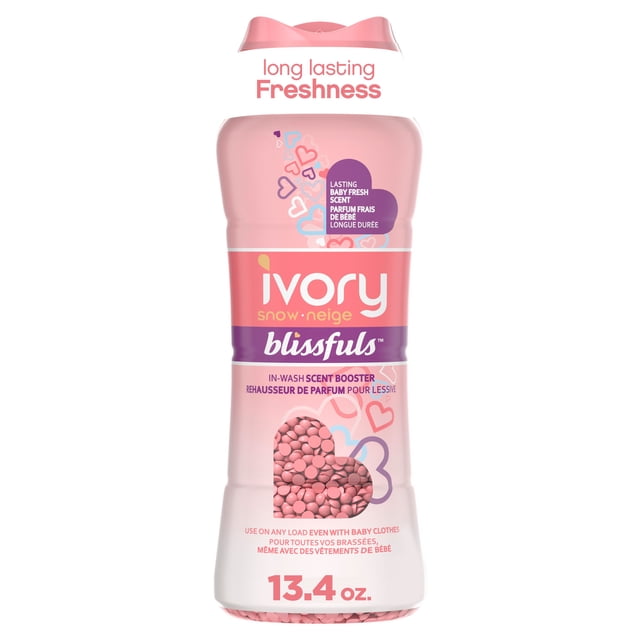 Ivory Snow Blissfuls In-Wash Laundry Scent Booster Beads in a 13.4 oz pink bottle with a flip-top lid, featuring heart graphics and text promoting long-lasting baby fresh scent, safe for baby clothes and all fabrics, enhancing laundry freshness in any wash load.