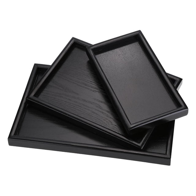 WALFRONT Rectangle Shape Solid Wood Tea Coffee Snack Food Meals Serving Tray Plate Restaurant Trays, Tea Serving Tray, Wood Tea Tray. A set of three black rectangular serving trays made from durable and eco-friendly solid wood. Each tray features a smooth surface, raised edges to prevent spills, and a modern, elegant design. Suitable for serving tea, coffee, snacks, or meals in homes, restaurants, or coffee shops. Available in sizes approximately 22x12x2cm, 30x20x2cm, and 25x18x2cm.
