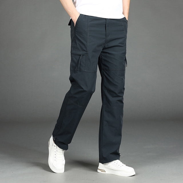 Men's Casual Comfort Drawstring Pants in grey, made from lightweight polyester with a regular fit and solid color design. These men's joggers feature an adjustable drawstring waist and deep pockets, perfect for summer outdoor sports and casual daily wear. Styled with white sneakers and a white t-shirt, the pants are displayed in a front-facing view against a neutral grey background.
