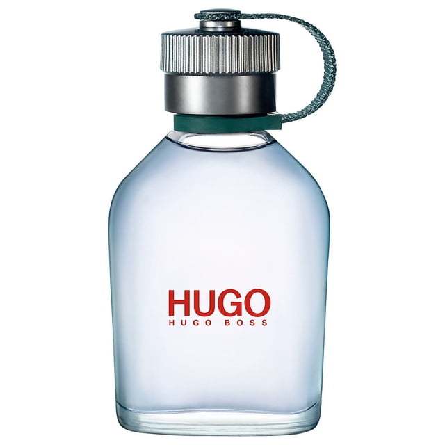 Hugo Boss Eau De Toilette Spray for MEN 75 ml featuring a clear, rounded rectangular glass bottle with a silver ribbed cap attached by a green fabric loop and red HUGO BOSS branding, an aromatic green men's cologne with notes of lavender, mint, and cedar, ideal for everyday use.