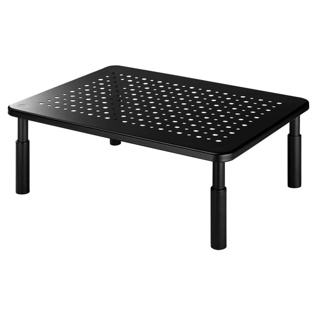 blackweb Increased Airflow Adjustible Monitor Stand (BWA22HO009C-Black) shown in a 3/4 angled view with a black rectangular metal platform featuring circular ventilation holes for airflow. It has four adjustable cylindrical legs set at the lowest height, supporting up to 36.8 lbs. The stand measures 14.5 by 11 inches and includes non-slip leg tips for stability. Suitable for ergonomic monitor placement and often used as a compact riser for laptops or small printers to improve desk airflow and organization.