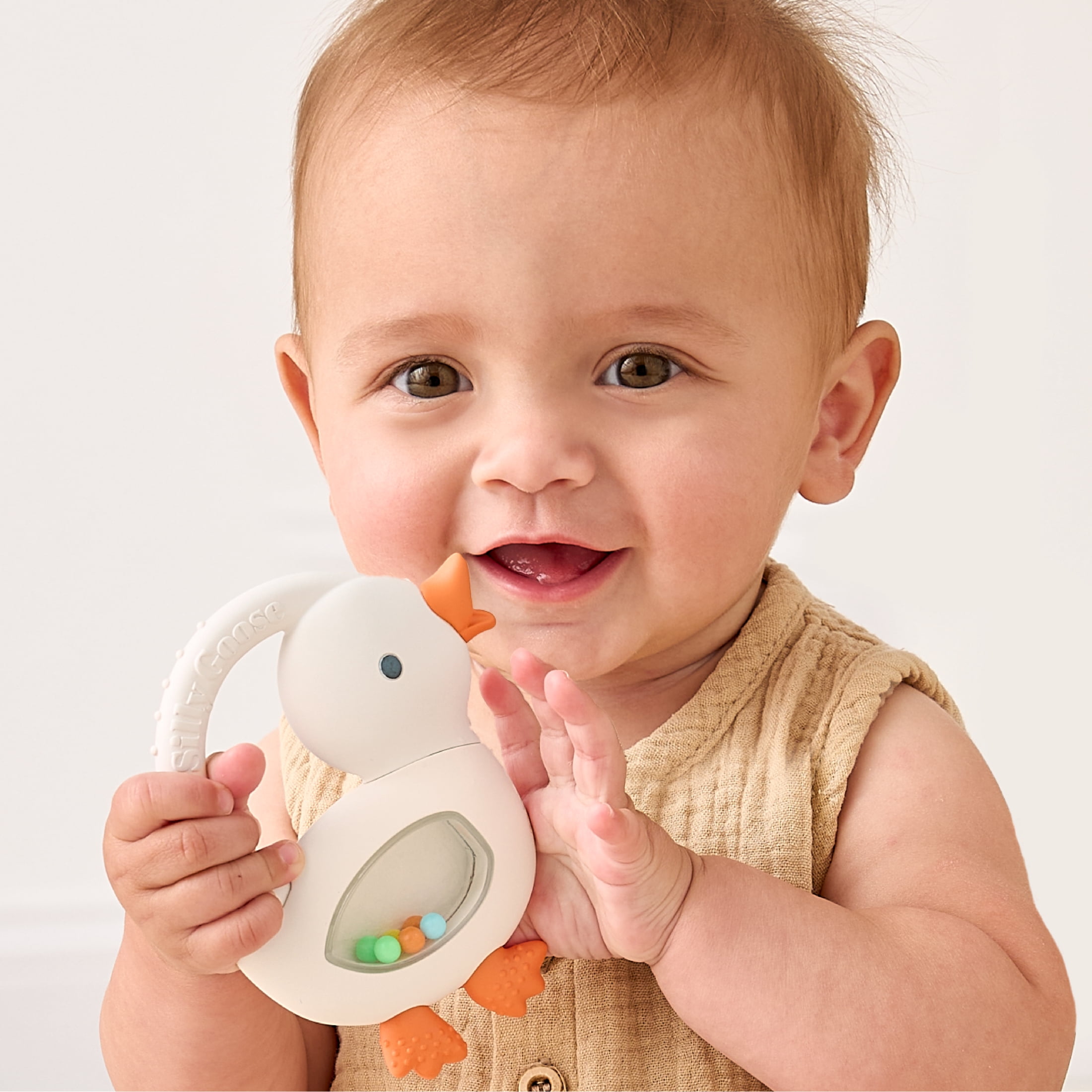 Itzy Ritzy Bitzy Shake™ Goose Silicone Teether and Rattle for Infants, 3+ Months