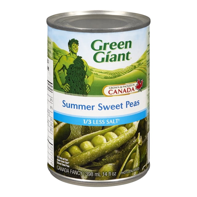 Green Giant Summer Sweet Peas 1/3 Less Salt canned vegetables in a 398 mL (14 fl oz) metal can with a label showing fresh green pea pods and the Green Giant logo, grown and packed in Canada, ideal for adding a low-sodium vegetable side to salads, pasta, or recipes.