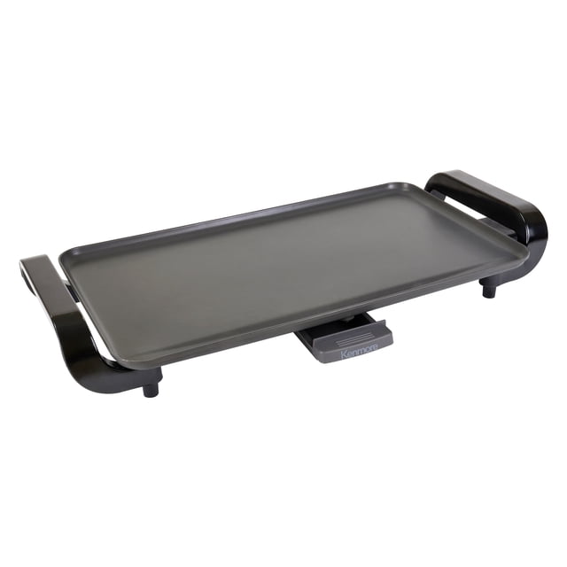 Kenmore Non-Stick Electric Griddle with Removable Drip Tray in black, featuring a large 10 x 18-inch cooking surface. The griddle has a non-stick surface for easy cleaning, a 1500W heating element for even and efficient heating, and an adjustable temperature control dial ranging from 'Warm' to 400°F (204°C). It includes a removable grease tray for convenient cleaning and a slim, compact design for easy storage. Ideal for cooking breakfasts, dinners, or meals in dorms, RVs, or home kitchens.