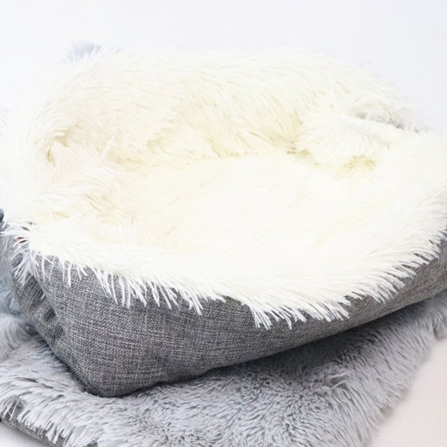 Cat Bed Washable Cat Beds for Indoor Cats Pet Bed Innovative Design with a soft ultra-long plush sleeping surface in white, surrounded by a gray imitation linen exterior. The bed is shown in its 'nest' configuration, featuring a customizable button loop system for versatile use. Suitable for all-season comfort, providing warmth in winter and breathability in summer.