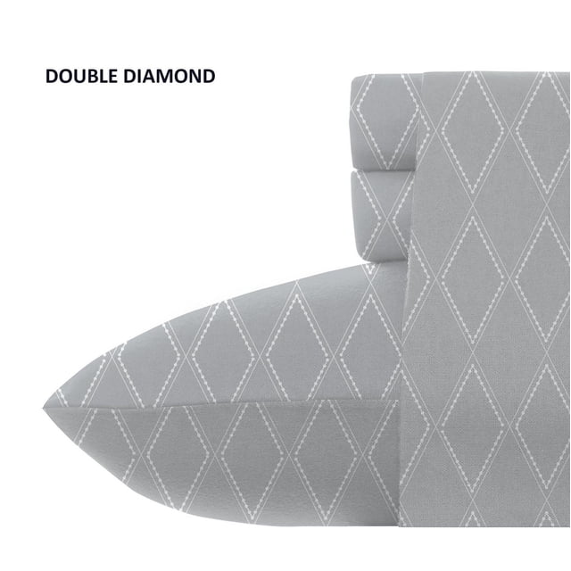 Double diamond patterned grey pillowcases with white geometric diamond outlines, shown in a close-up angled view highlighting fabric texture and stitching, ideal for bedding sets and bedroom décor.