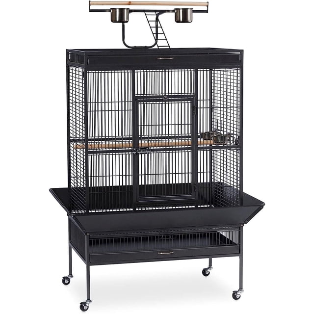 Prevue Wrought Iron Parrot Cage in black powder-coated steel featuring a large rectangular cage with 3/4 inch wire spacing, front access door with double locks, wooden perch, four stainless steel cups including two on the integrated cage top play stand, pull-out bottom grille and tray for easy cleaning, rounded corner seed guards to control debris, and a wheeled stand base for indoor bird use.