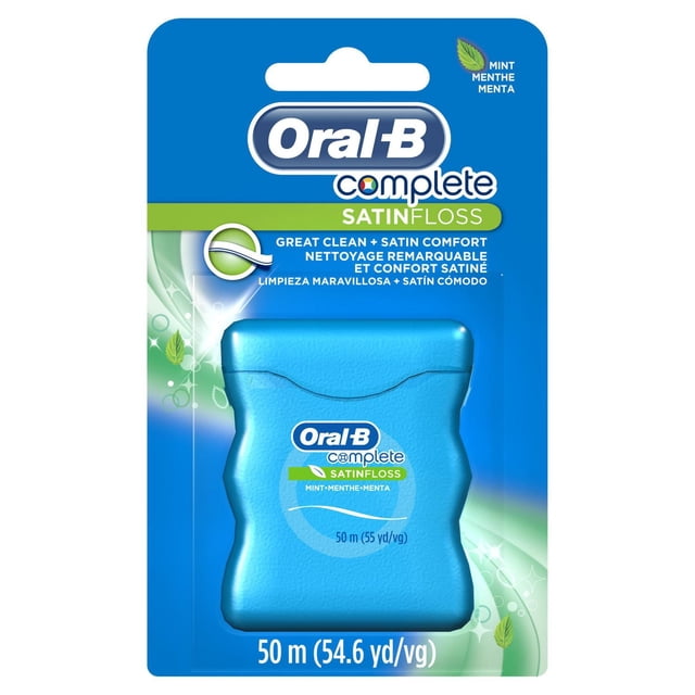 Oral-B Complete SatinFloss Dental Floss in mint flavour, in a blue textured plastic container holding 50 meters (54.6 yards) of floss, designed for plaque removal and comfortable satin-like flossing with a fresh mint burst.