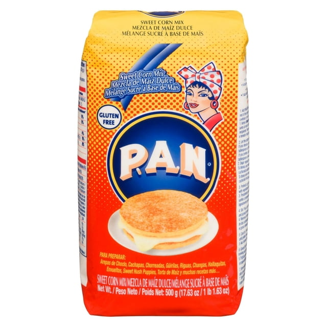 Grace PAN Sweet Corn Mix 500g package with yellow and red packaging featuring the PAN logo, gluten-free label, and an image of a corn arepa sandwich on a white plate, suitable for traditional Latin American corn dishes like cachapas and arepas.