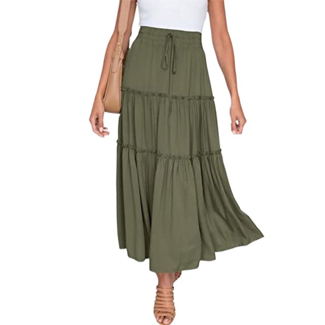 LUXUR Jupes pour Femmes Jupe Midi Évasée en Vert Armée, Présentant un design Taille Haute avec des Détails à Volants, une silhouette Bohème Fluide et un Ourlet Asymétrique. Fabriquée en polyester Léger, Cette Jupe Décontractée Est Idéale pour le Port Quotidien, les Fêtes, les Vacances Ou les Sorties à la Plage. Dotée d'Un Haut Blanc et de Sandales Beige.