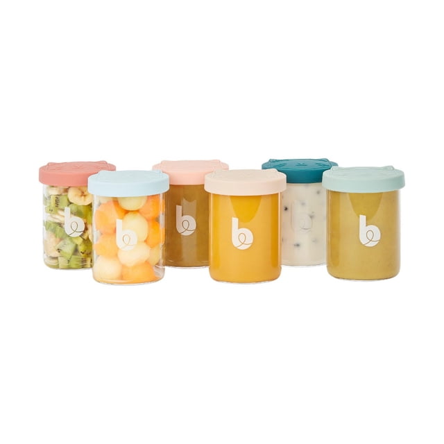 Babymoov Isy Bowls Glass Containers 6 x 8.5 oz set of six clear borosilicate glass jars with pastel airtight silicone lids in blue, pink, and teal, filled with various baby foods including fruit pieces and purees, designed for versatile baby food storage and reheating.