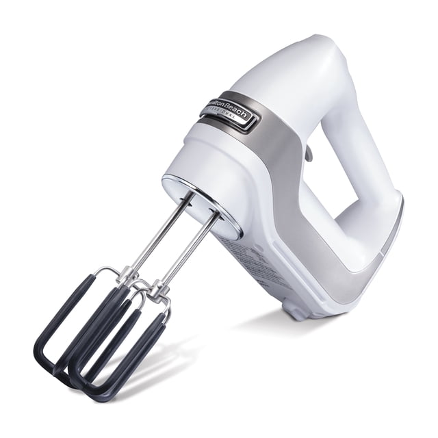 Hamilton Beach Professional 7-Speed Electric Hand Mixer in white and gray with stainless steel SoftScrape™ beaters edged in black silicone, ergonomic handle, and Hamilton Beach logo, shown at a 3/4 angle. Features 7-speed mixing control, slow start to reduce splatter, and QuickBurst™ power for precise baking and food prep.