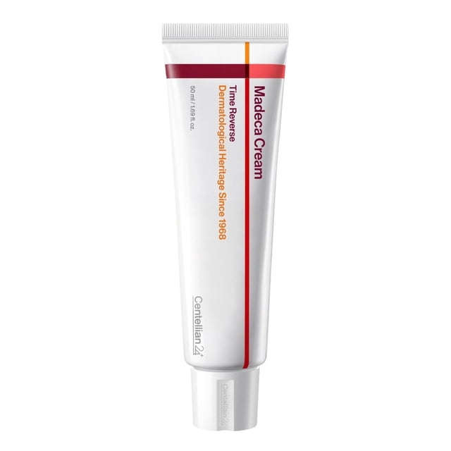 CENTELLIAN24 Madeca Cream Time Reverse 50ml in a white tube with red and orange accents, formulated with 4,800 ppm Madecassic Acid and Centella Asiatica-derived ingredients. This anti-aging cream targets fine lines, enhances skin firmness, and provides deep hydration. Lightweight and suitable for sensitive and acne-prone skin, it absorbs quickly without leaving stickiness.