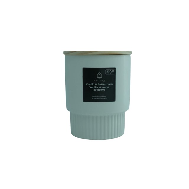 HOMETRENDS Scented Candle in a matte light blue ceramic jar with a natural wooden lid, labeled Vanilla & Buttercream scent in English and French, offering a warm home fragrance and approximately 45 hours burn time, shown front-facing on a white background.