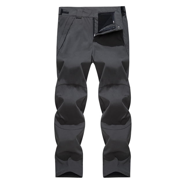RKSTN Pantalon pour Hommes Pantalon d'Automne Ensemble 2 Pcs Pantalon de Ski Détachable Plus Pantalon Pantalon de Randonnée Extérieur Pantalon Pleine Longueur. Ces Pantalons à Jambe Droite, Coupe Ample, Sont Faits d'Un Tissu polyester Léger de Couleur Gris Foncé Uni. les Pantalons Ont un design Détachable, des Poches Fonctionnelles et une Taille Élastique durable, les Rendant Adaptés aux sports d'Hiver, à la Randonnée et aux Tenues Décontractées. Conçus pour le Confort et la Polyvalence, Ils Sont Idéals pour les Activités de Plein Air pendant les Saisons Plus Froides.