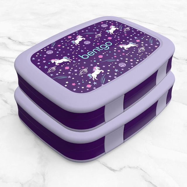 Bentgo Kits Prints 2-Pack - Unicorn with two stacked purple and lavender kids lunch boxes featuring leak-proof, durable design and five compartments for balanced meals, decorated with white unicorns, stars, and planets on the lid, ideal for active children.