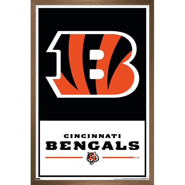 NFL Cincinnati Bengals - Logo 21 Wall Poster with Magnetic Frame, 22.375" x 34" displaying the Bengals logo with orange and black tiger stripes outlined in white on a black background, with bold 'CINCINNATI BENGALS' text and a small tiger head graphic below on a white panel accented by orange lines, all framed in a brown magnetic wood frame, suitable for sports-themed wall décor in homes or offices.