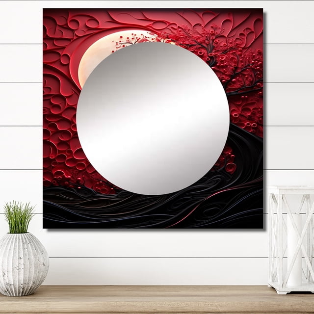 Designart 'Radiant Ruby Red Moon' square mirror wall decor featuring a vibrant red and black fantasy design with a circular mirror at the center. The astronomy-inspired artwork includes intricate patterns resembling a moonlit night and is mounted on a 1-inch floating frame. Suitable for bathrooms, entryways, or living rooms, it comes with drywall anchors and screws for easy installation. Explosion-proof film ensures safety during use.