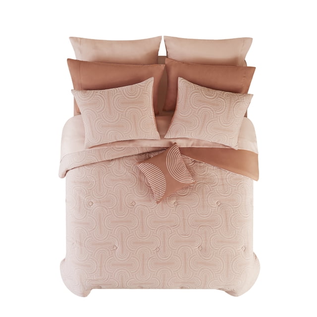 Mainstays 11 Piece Bed in a Bag in soft pink arch jacquard design, including comforter, pillow shams, flat and fitted sheets, bed skirt, pillowcases, and decorative cushion, made with 45% recycled polyester and OEKO-TEX certified, machine washable for easy care.