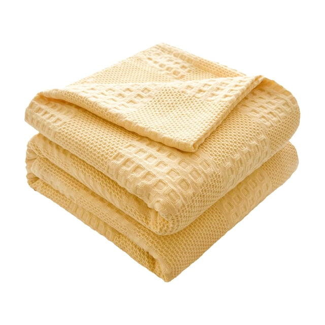 Cooling Blanket Bedding Pure Cotton Blanket Lightweight Warm Blanket Soft And Breathable Wrinkle Resistant 59x79IN Summer Comforter Queen Size Plush Throw Blankets for Bed, Couch and Sofa. The blanket features a tightly woven square pattern for durability and texture, made from premium cotton for breathability and comfort. Its lightweight design is suitable for all seasons, offering cooling in summer and warmth in winter. The blanket is shown folded, highlighting its soft texture and elegant weave in a light yellow color.