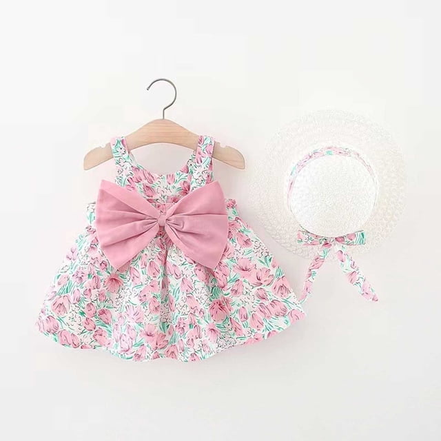 Robe pour Nouveau-Né Sans Manches, Robe Tutu pour Bébé Fille, Robe d'Été avec Chapeaux, Deux Pièces, Robe d'Anniversaire pour Tout-Petite Fille 2-3 Ans. la Tenue Comprend une Robe Tutu Florale Sans Manches avec un Grand Nœud Rose à l'Avant et un Chapeau de Paille Assorti avec une Bande Florale et un Nœud. Fabriquée en Tissu Mélange de Coton Doux et Respirant, Cet Ensemble Est Idéal pour les Événements d'Été comme les Anniversaires, les Mariages Ou les Sorties Décontractées. la Robe a une Taille Décontractée et un Dos Nu pour le Confort, Tandis