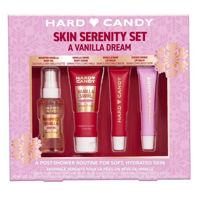 Hard Candy A Vanilla Dream Skin Serenity Gift Set with Whipped Vanilla Body Oil, Vanilla Swirl Body Scrub, and Vanilla Mint and Sugar Cookie Lip Balms in a pink box with gold snowflakes. This body care gift set provides a hydrating post-shower routine with soft vanilla scents.