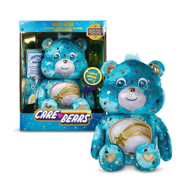 Care Bears Medium Plush Collector's Edition Wish Bear with turquoise fur patterned with gold shooting stars, shiny gold accents on ears, paws, and belly badge featuring a glittering shooting star, and eyes with star-shaped highlights, shown inside its limited edition blue and gold box and separately outside the packaging.