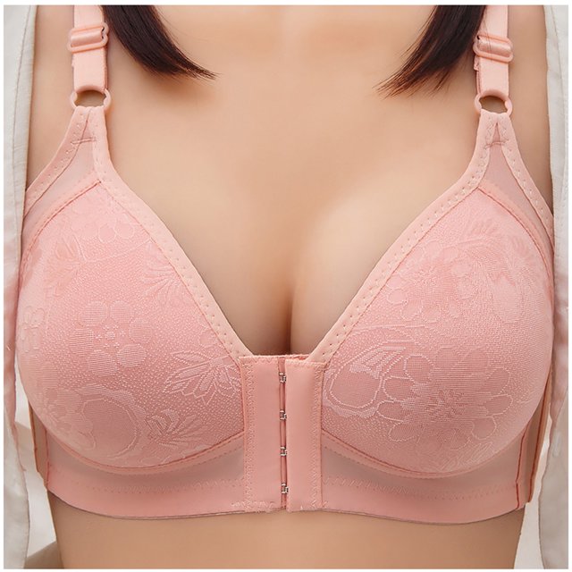 Timegard Front Closure Bras for Women No Underwire Adjustable Strap Full Support Comfortable Seniors Bra in a soft pink color. The bra features a front hook-and-eye closure, adjustable straps, and a floral textured design on the cups. Made from breathable, stretchy fabric for comfort and support, it is designed to smooth bumps and bulges on the back and sides. Suitable for pairing with various outfits, including t-shirts, tank tops, and sweaters.