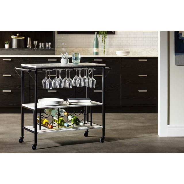 South Shore Maliza Bar Cart in faux Carrara marble with black metal frame, featuring three water-resistant shelves, a wine bottle rack for 12 bottles, an overhead rack for 18 wine glasses, and four caster wheels with two brakes for easy mobility and stability.