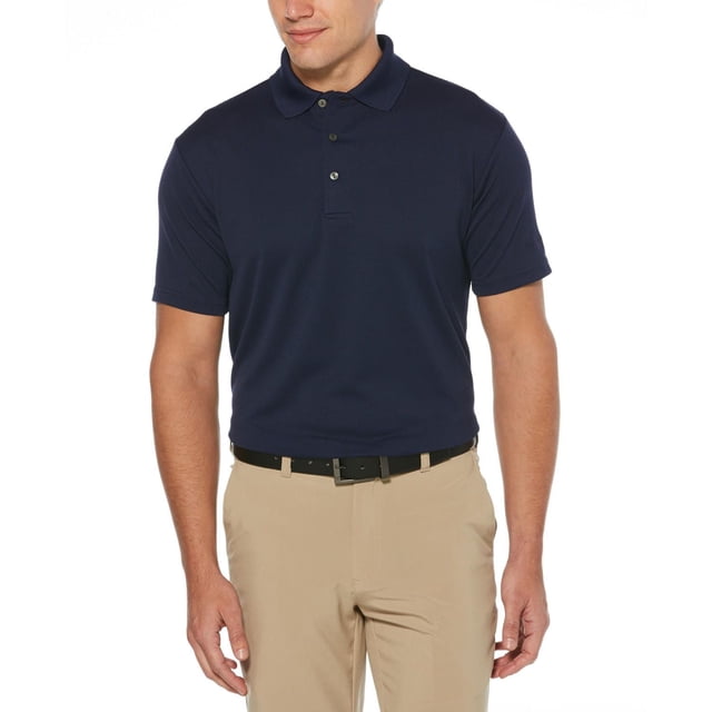 Men's Performance Easy Care Solid Short Sleeve Polo Shirt in navy blue featuring moisture-wicking and UV protection fabric technology, shown tucked into beige golf pants with a black belt in a front-facing view, ideal for golf and casual wear.