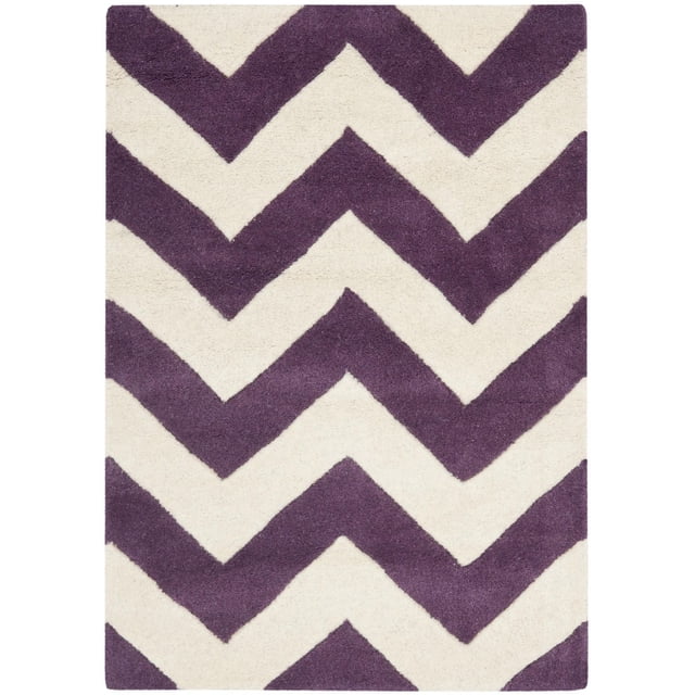 Safavieh Chatham Jake Zigzag Stripes Area Rug with hand-tufted wool and medium plush pile, featuring a purple and off-white zigzag stripe pattern, suitable for contemporary accent areas and often used to add softness and style to living spaces.