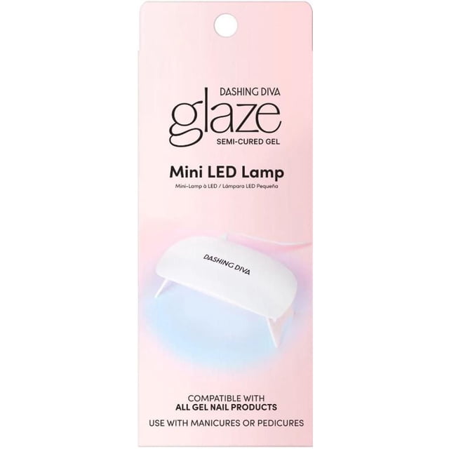 DASHING DIVA Lampe MINI à DEL sur Emballage Rose avec Texte Noir, Montrant une Lampe à DEL Compacte Blanche en Forme de Dôme avec Pattes Pliables et Image de Marque DASHING DIVA, Conçue pour Durcir les Ongles en gel Semi-Durcis, compatible avec Tous les Produits d'Ongles en gel pour Manucures et Pédicures.