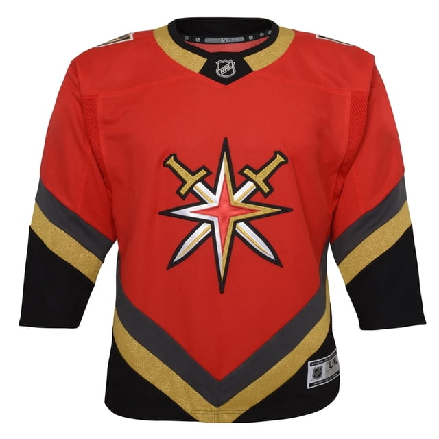 Youth Las Vegas Golden Knights Retro Reverse Jersey featuring the Power of 31 Special Edition design with alternate team colours and logo. Made from 100% polyester, this jersey showcases a bold red base with gold and black accents, including the team logo prominently displayed on the chest. Designed by Outerstuff, it is ideal for young fans of the NHL team.