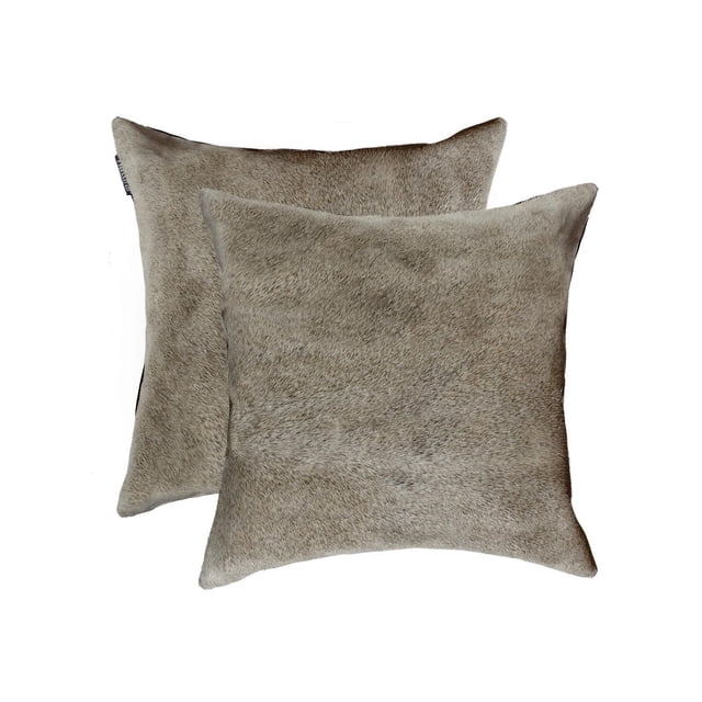 TORINO COWHIDE PILLOW 18"X18" 2-PACK with two square pillows made from 100% natural Indian cowhide in light brown and beige shades, featuring hand-stitched edges, hidden zipper closures, and soft microsuede backing, ideal for layering in home décor and adding natural texture.