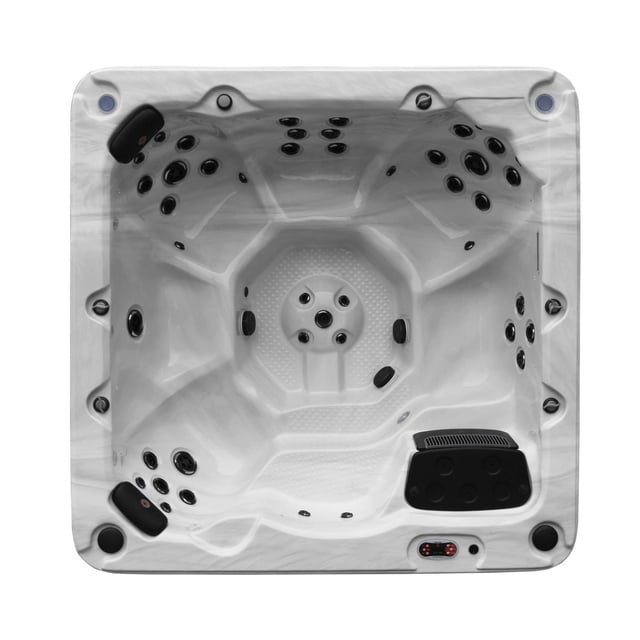 Victoria 7-Person 46-Jet Hot Tub with white marble-effect interior, featuring multi-level ergonomic seating including captain's chairs and a lounger, equipped with 46 black adjustable hydrotherapy jets, two black headrests, and a digital control panel on the rim.