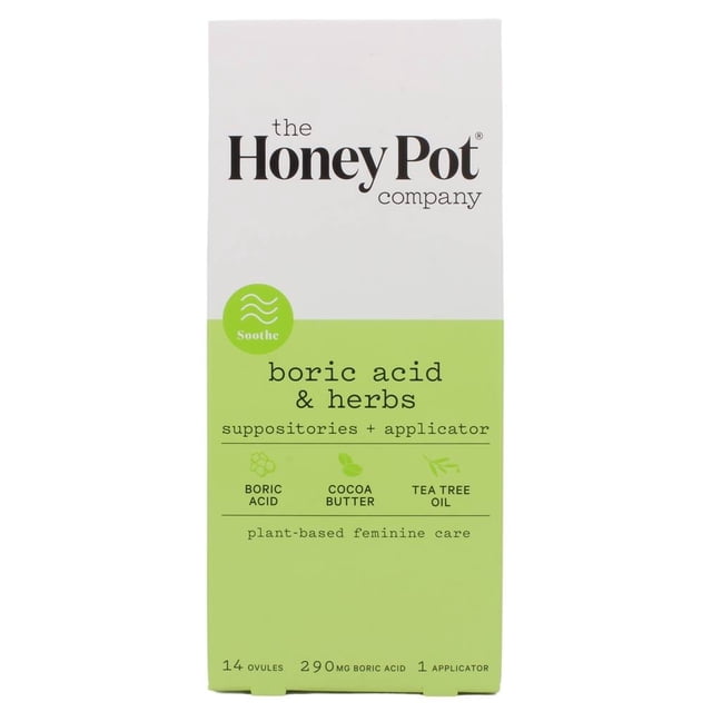 The Honey Pot Company Boric Acid & Herbs Suppositories + Applicator, 14 count. The packaging features a white and green design with text highlighting key ingredients such as boric acid, cocoa butter, and tea tree oil. It emphasizes plant-based feminine care and includes details like 290 mg boric acid per suppository and one applicator.