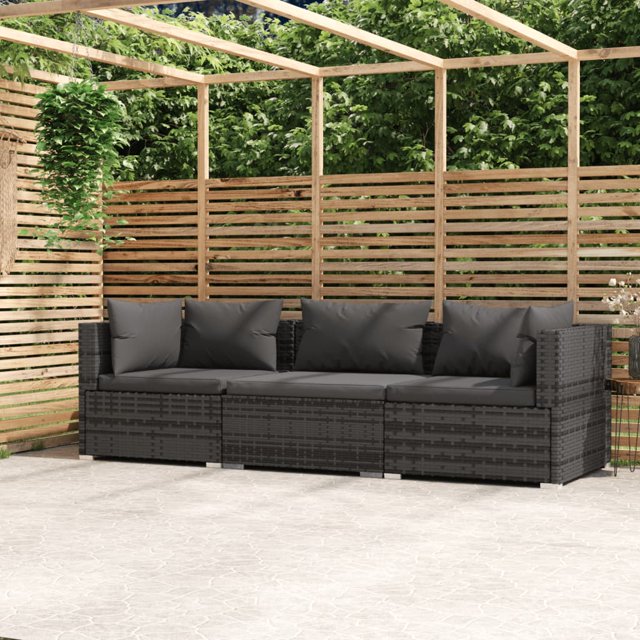vidaXL 3-Seater Sofa with Cushions Grey Poly Rattan shown in an outdoor patio setting. This modular patio furniture features waterproof PE rattan in grey, anthracite cushions, and a powder-coated steel frame with plastic chrome feet. Ideal for outdoor seating, the set includes one middle sofa, two corner sofas, three seat cushions, and five back pillows, offering versatile arrangement options.