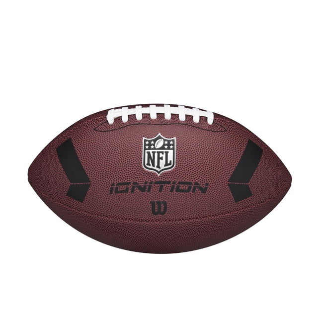 WILSON NFL IGNITION JR FOOTBALL junior-sized composite cover football with front-facing pro-style silhouette showing Wilson script and NFL shield; textured pebbled synthetic leather surface and stitched white laces, sized for ages 9+ to support secure grip and throwing mechanics; shown on grass; often used for youth throwing drills and backyard play.