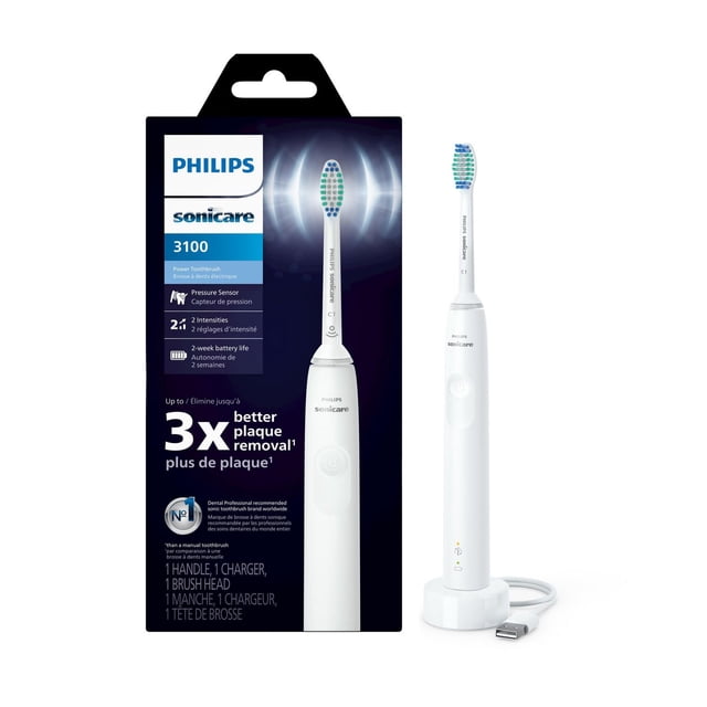 Philips Sonicare 3100 Power Toothbrush in white with pressure sensor and two intensity settings, displayed with USB charging base and packaging highlighting up to 3x better plaque removal and 2-week battery life for effective oral care.