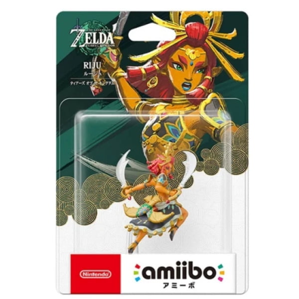 Riju - Série Legend of Zelda - amiibo (JPIM) dans l'Emballage d'Origine. la Figurine Représente Riju, un Personnage de la Série Legend of Zelda, dans une pose Dynamique avec Deux Cimeterres. l'Emballage Présente la Marque Legend of Zelda et un Texte Japonais, avec un design vibrant Mettant en Valeur Riju et un Arrière-Plan Doré. Compatible avec Nintendo Switch et d'Autres Logiciels Compatibles avec amiibo.