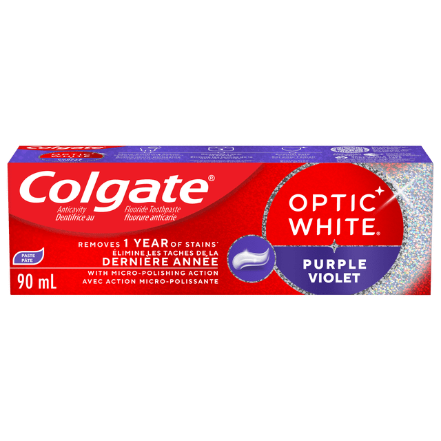 Colgate Optic White Purple Teeth Whitening Toothpaste, Fresh Mint, 90 mL box with red and purple packaging, featuring micro-polishing action that removes 1 year of stains, fluoride for cavity protection, enamel-safe formula, and a refreshing mint flavor for daily use.