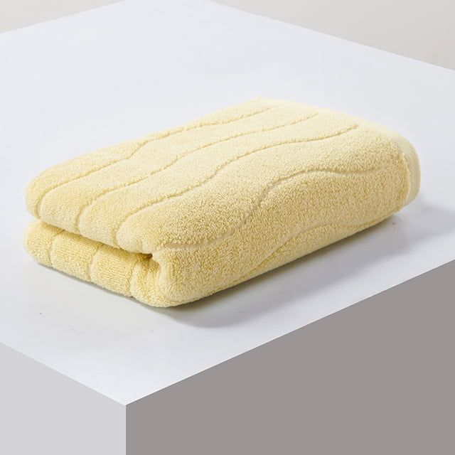 Meitianfacai Towel Thickened Soft Absorbent Plain Color Household Wash Face Gift Towel in beige, crafted from polyester fiber for quick drying and excellent absorbency. Measuring 75x35 cm, it features reinforced double-needle stitching for durability and a smooth, non-shedding texture. Suitable for bathrooms, spas, or dorm rooms. Displayed folded on a white surface.