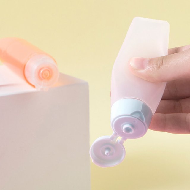 Travel Squeeze Bottle Shower Gel Small Accessories Dispenser Toothpaste Container Refillable Leakproof Pocket Squeezable Dispenser Tube Accessories 50ML Pink