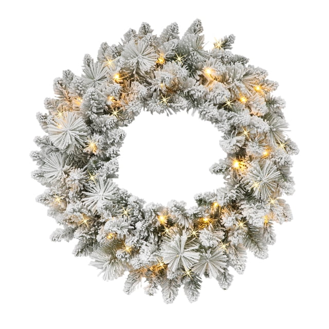 Holiday Time 24-inch pre-lit flocked Christmas wreath with white snow-covered pine branches and warm yellow LED lights
