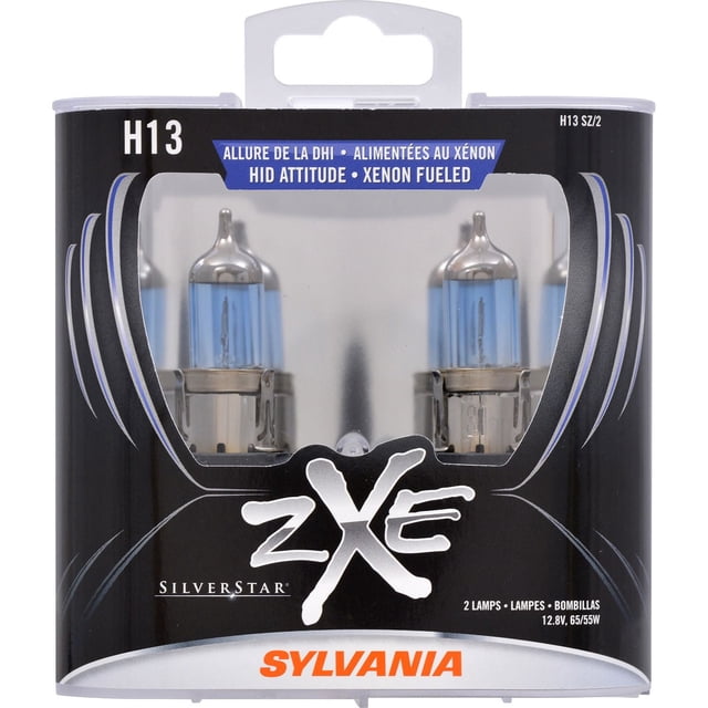 SYLVANIA H13 zXe Halogen Headlight pack containing two halogen bulbs with cobalt blue coating and silver metal bases, designed for automotive exterior car lighting, featuring zXe branding and HID-style white light performance.